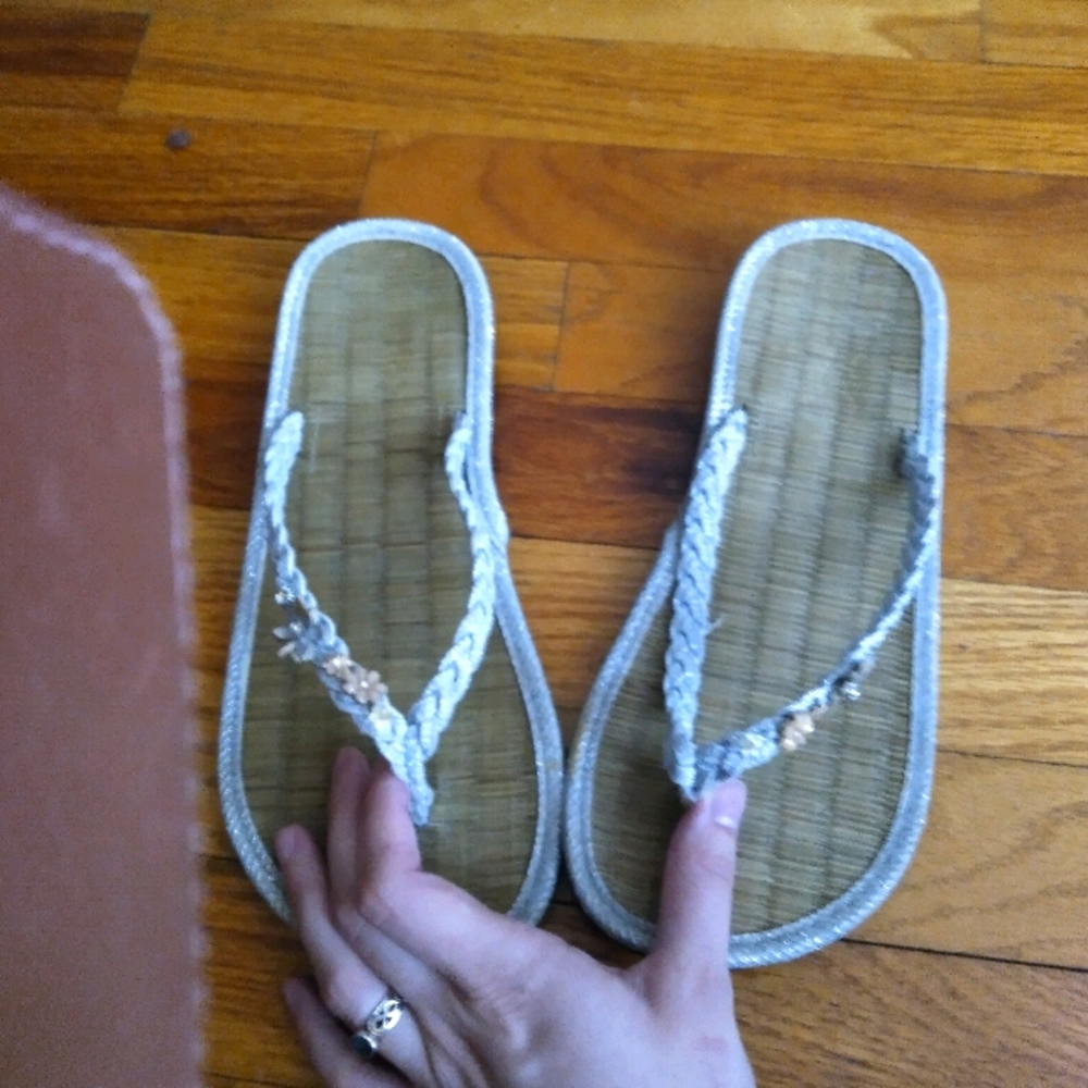 Accessorize floral flip flops